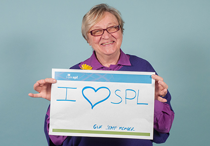 library staff holding sign saying I love SPL