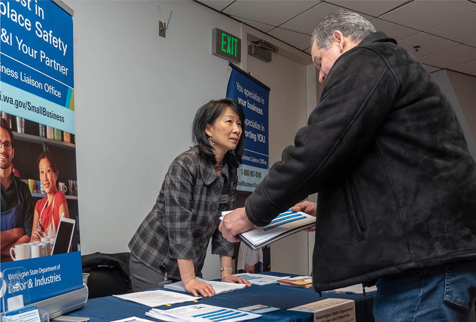 Patron receiving business advice at a workshop at the Central Library.
