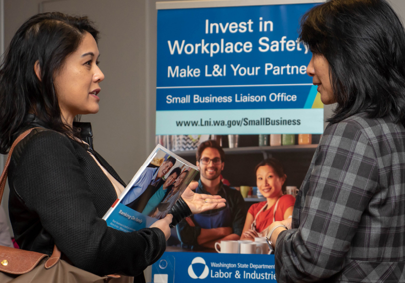 Two patrons attending a Library to Business event