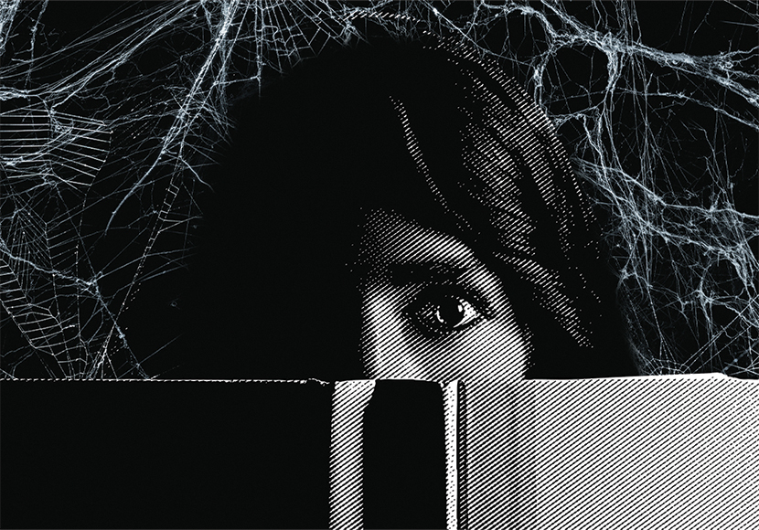 A face surrounded by spider webs and partially obscured by a book.
