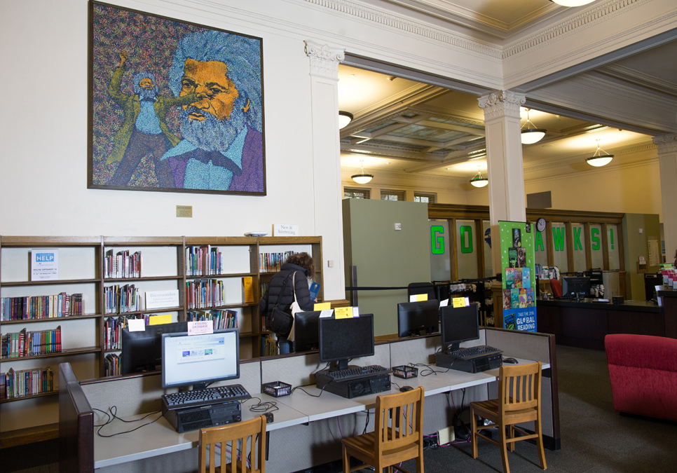 Library patrons in seating area at the Douglass-Truth Branch