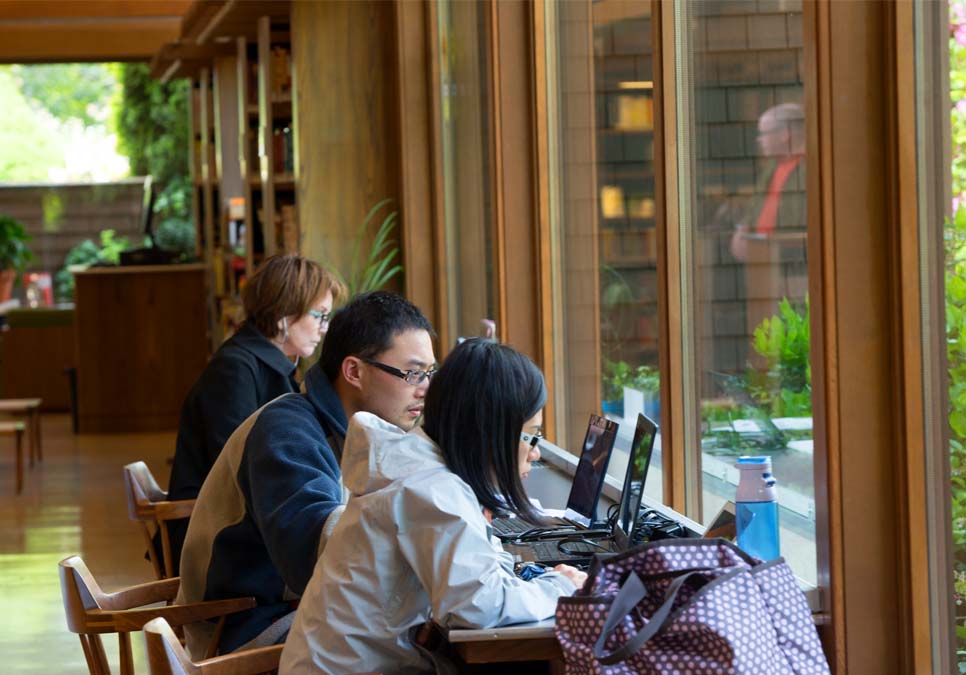 Library patrons using laptops at the Magnolia Branch