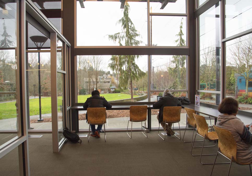 Library patrons using laptops at the Northgate Branch