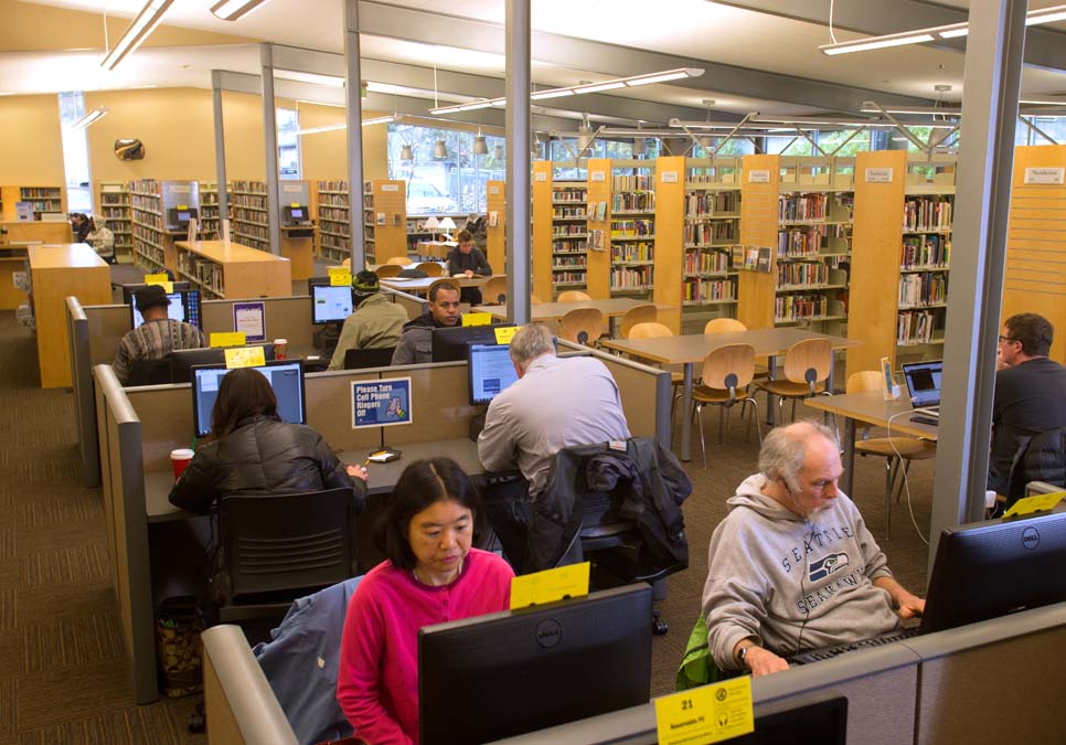 Library patrons using public computers at the Southwest Branch