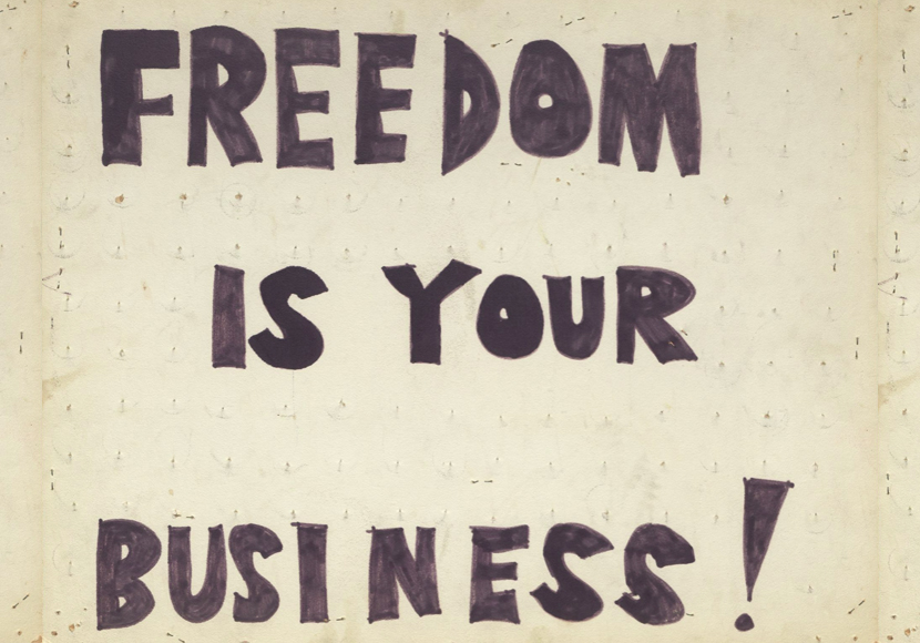 Photo from collection showing a piece reading 'Freedom is your business.'