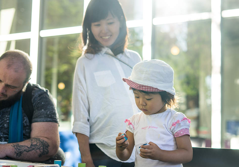 Family crafting at art on the plaza event at the Central Library