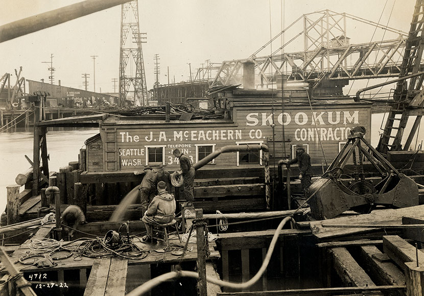 Photo of Men working at West Spokane Street Bridge, Seattle, December 27, 1922.