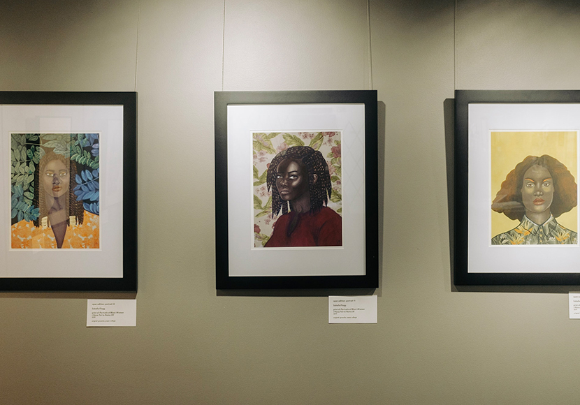 Three exhibit pieces mounted on a wall.