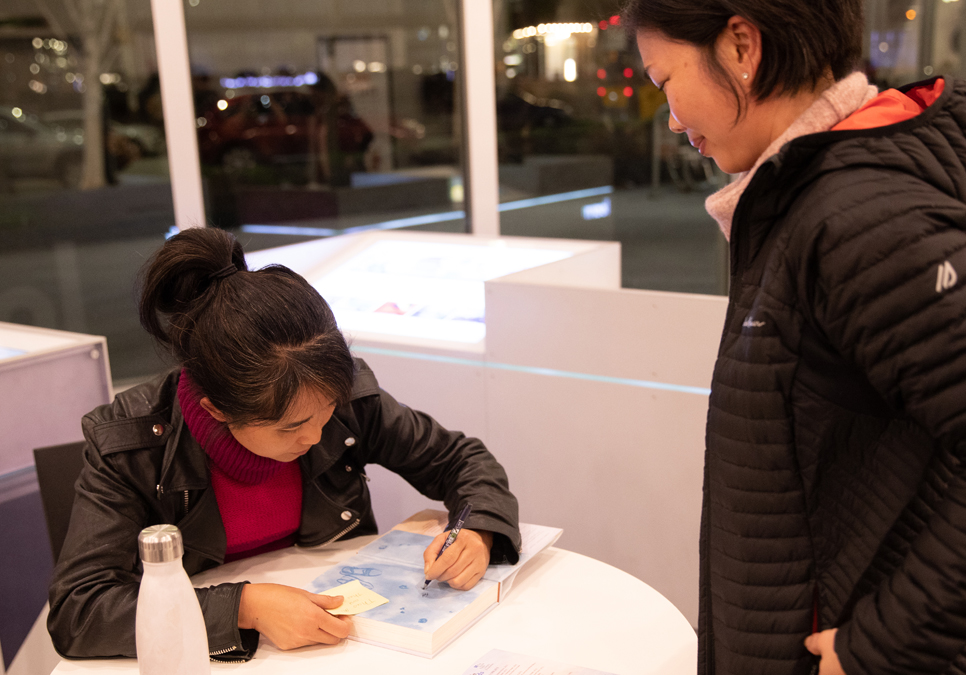 2018 Seattle Reads author Thi Bui signs books at the Central Library