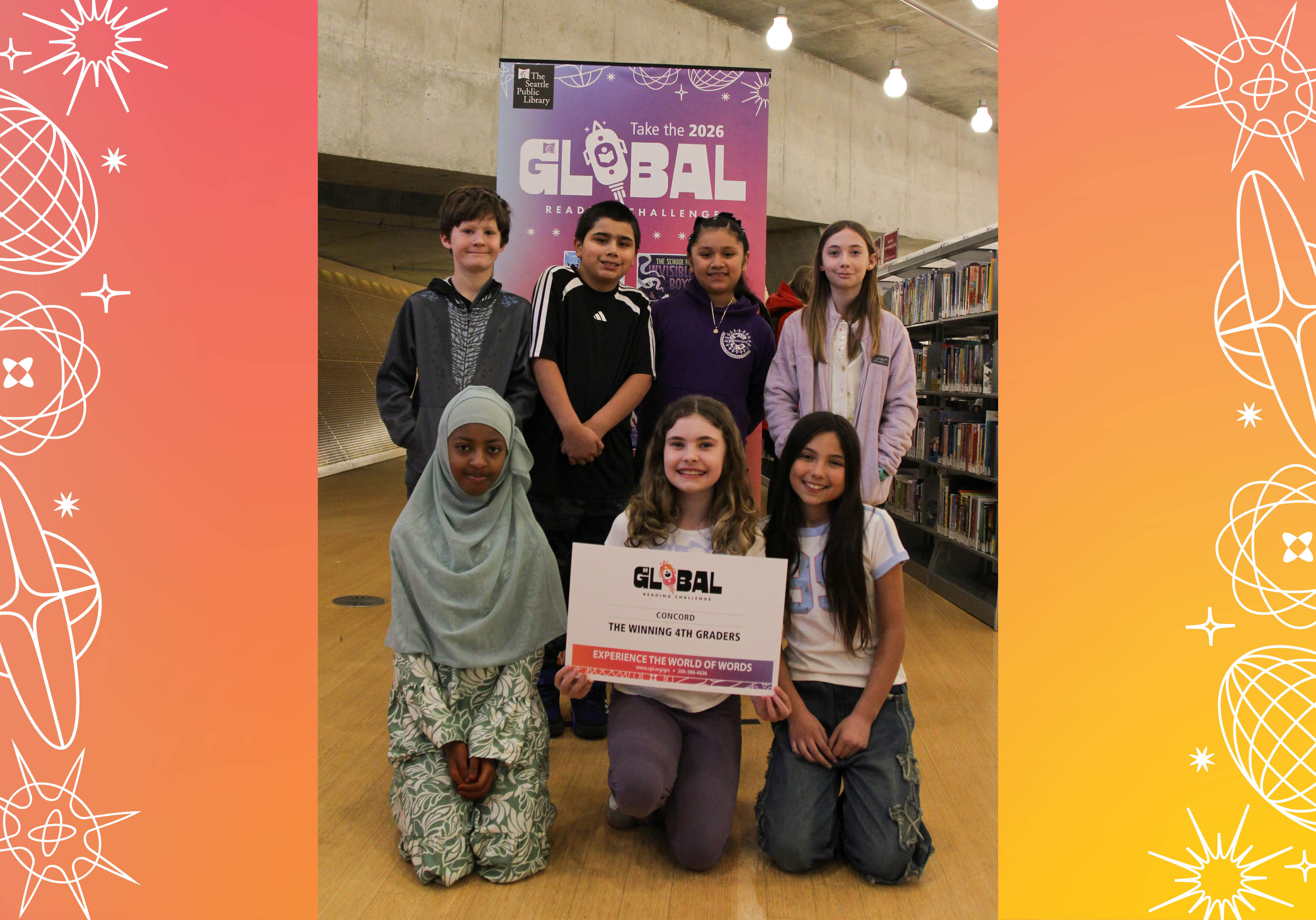 Seven members of Concord's The Winning 4th Graders posing with sign